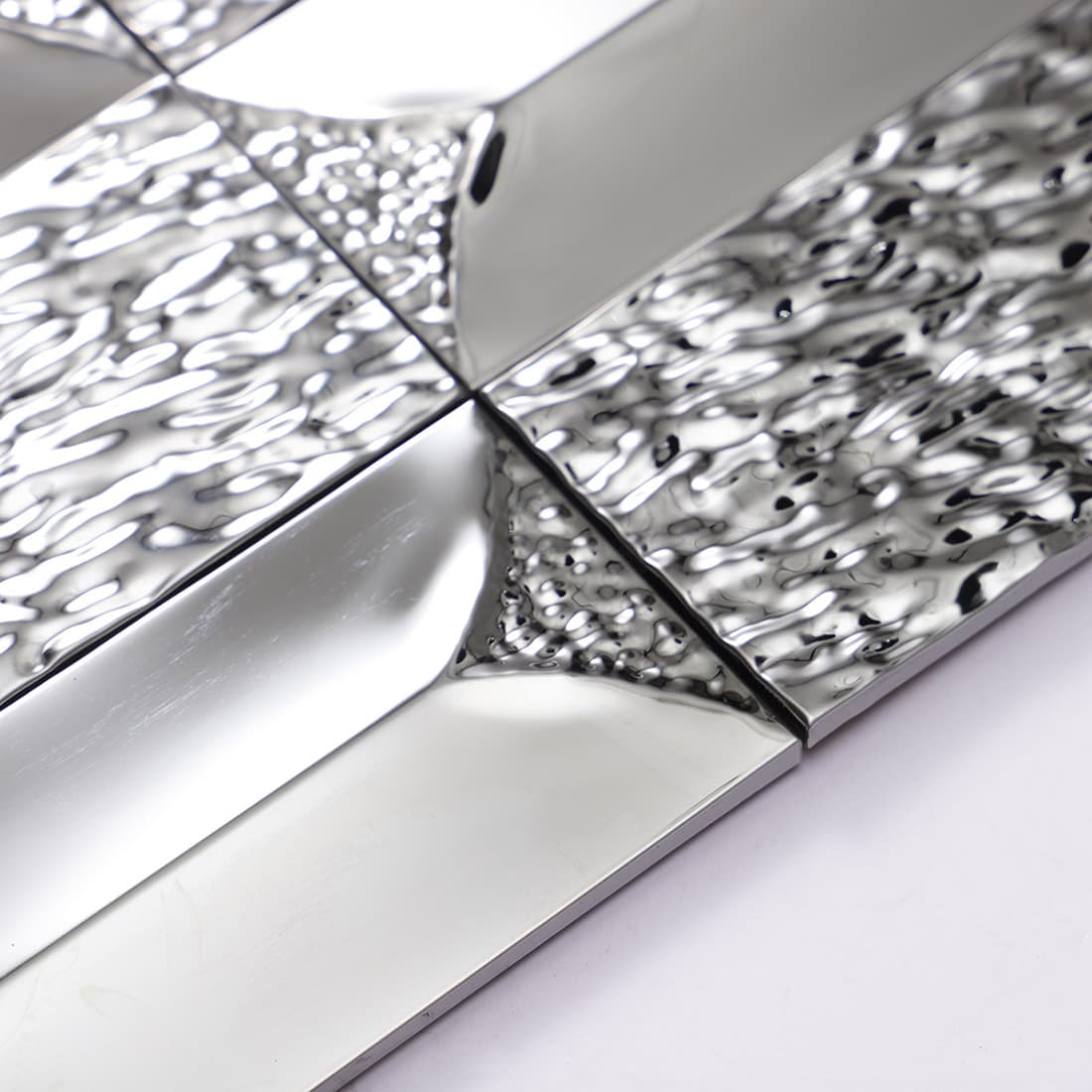 Extreme close-up of the transition between mirror and ripple finishes.