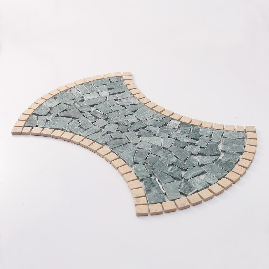 Angled view of green and beige marble irregular mosaic tile.