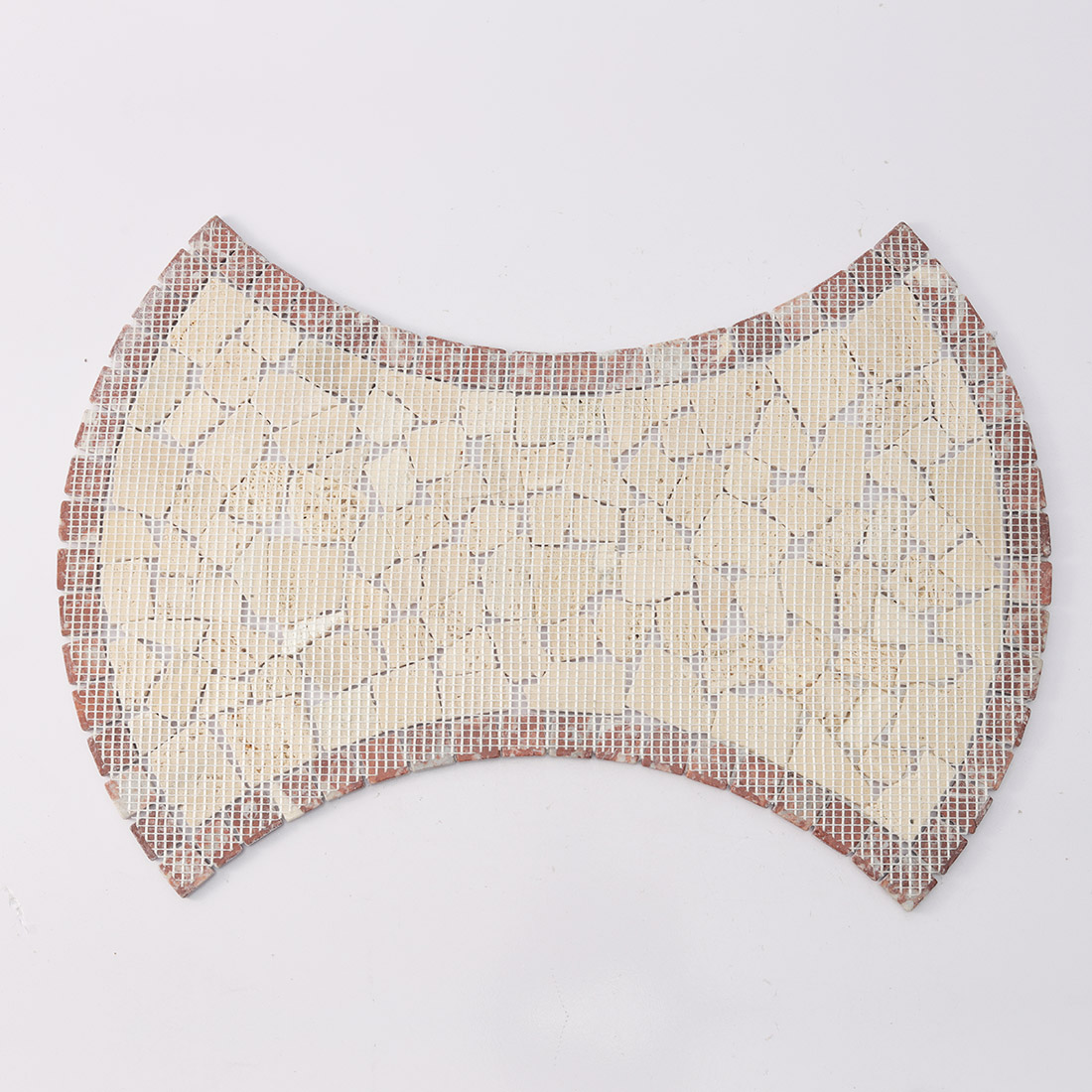 Mesh backing on the reverse side of the beige red mosaic.