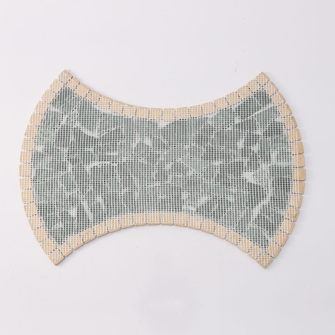 Mesh backing on the reverse side of marble irregular mosaic.