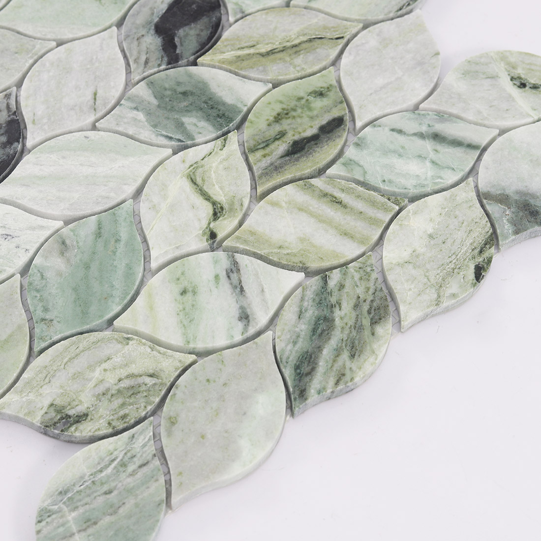 Close-up of the bottom chips of marble leaf mosaic.