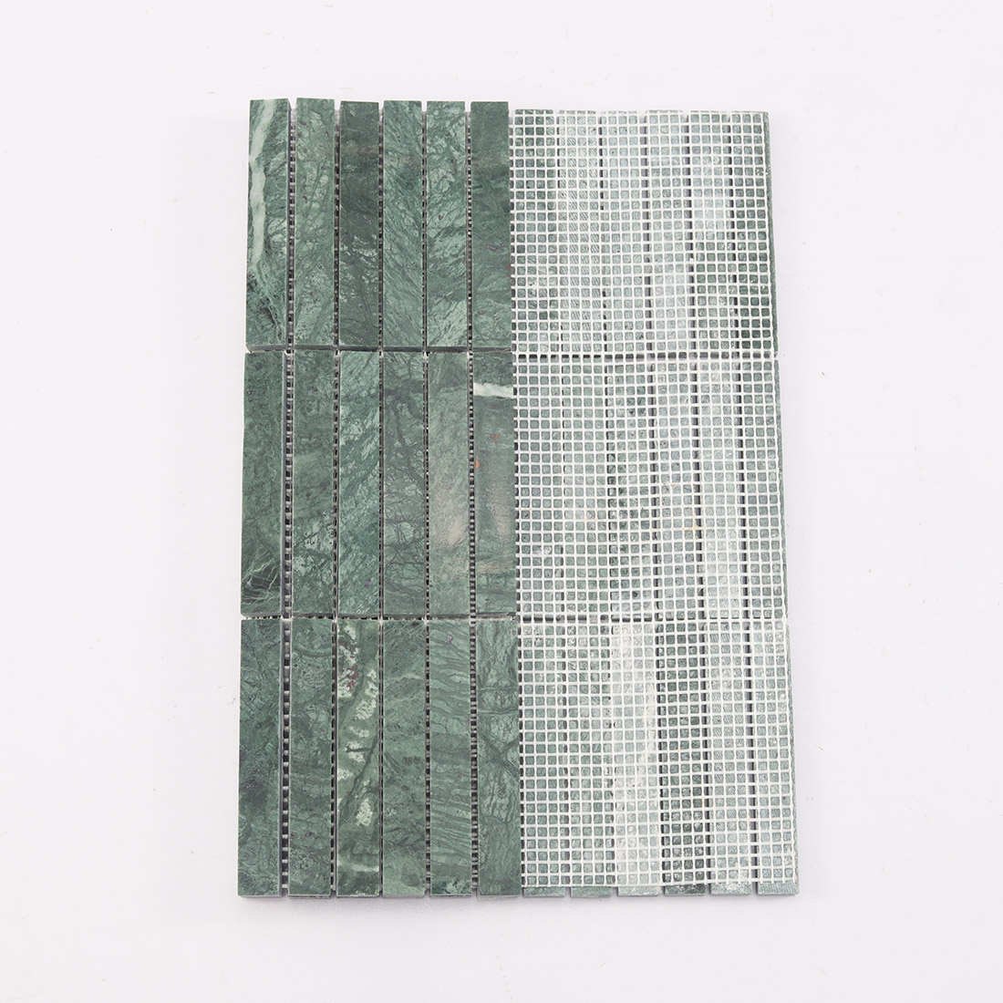Mesh backing on the reverse side of marble stacked mosaic.