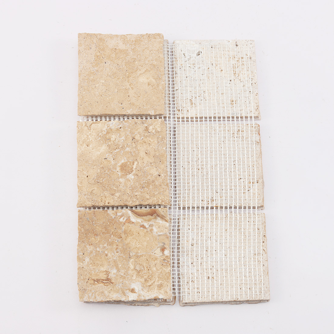 Back view of beige limestone mosaic tile with fiber mesh backing