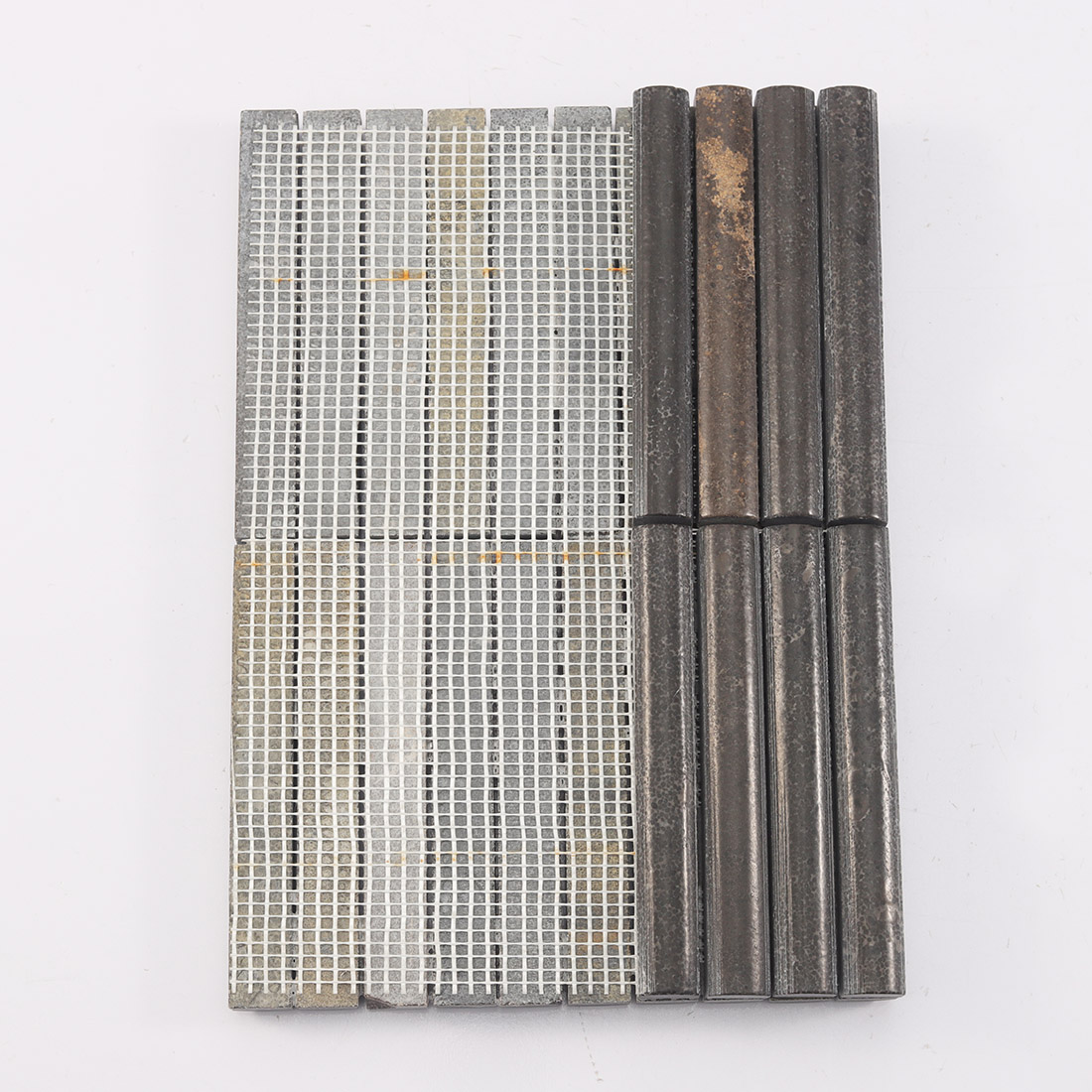 Chocolate brown fluted natural stone mosaic tile with visible mesh backing
