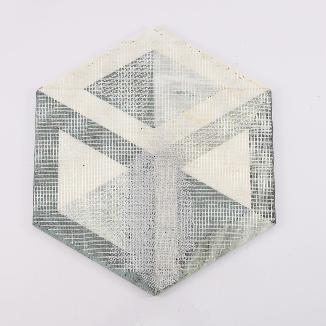 Back view of green and white hexagon marble mosaic tile with mesh backing