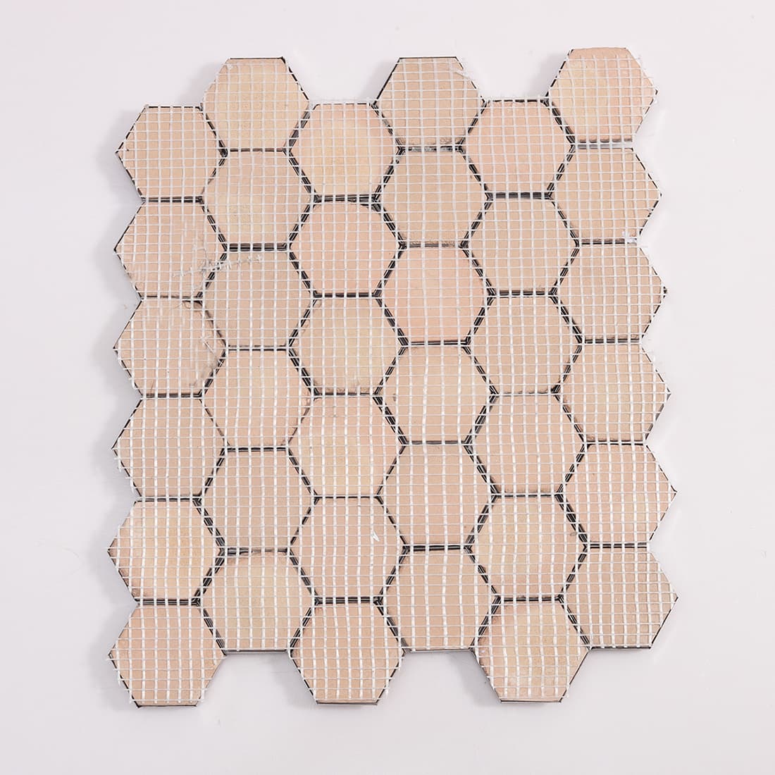 Back view of mesh backed silver hexagon metal mosaic tile sheet
