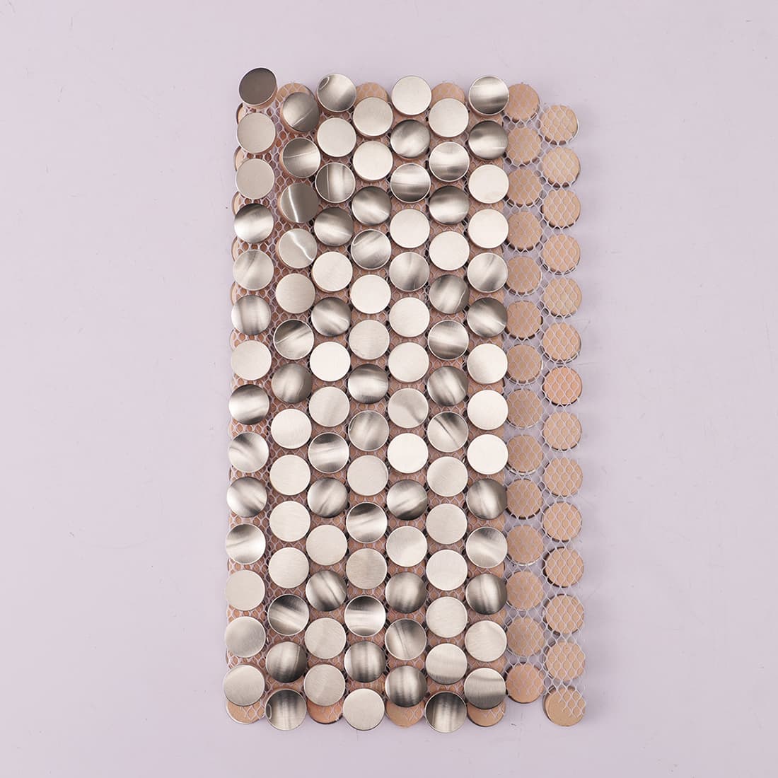 Mesh backed silver round stainless steel mosaic tile showing flexible sheet design