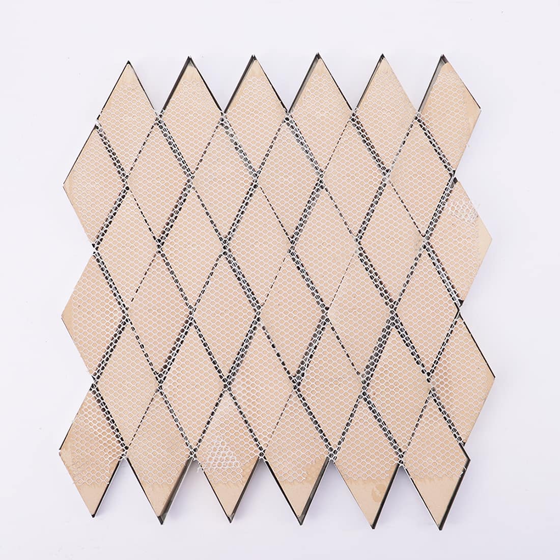 Back view of mesh backed white and gold elongated diamond mosaic tile