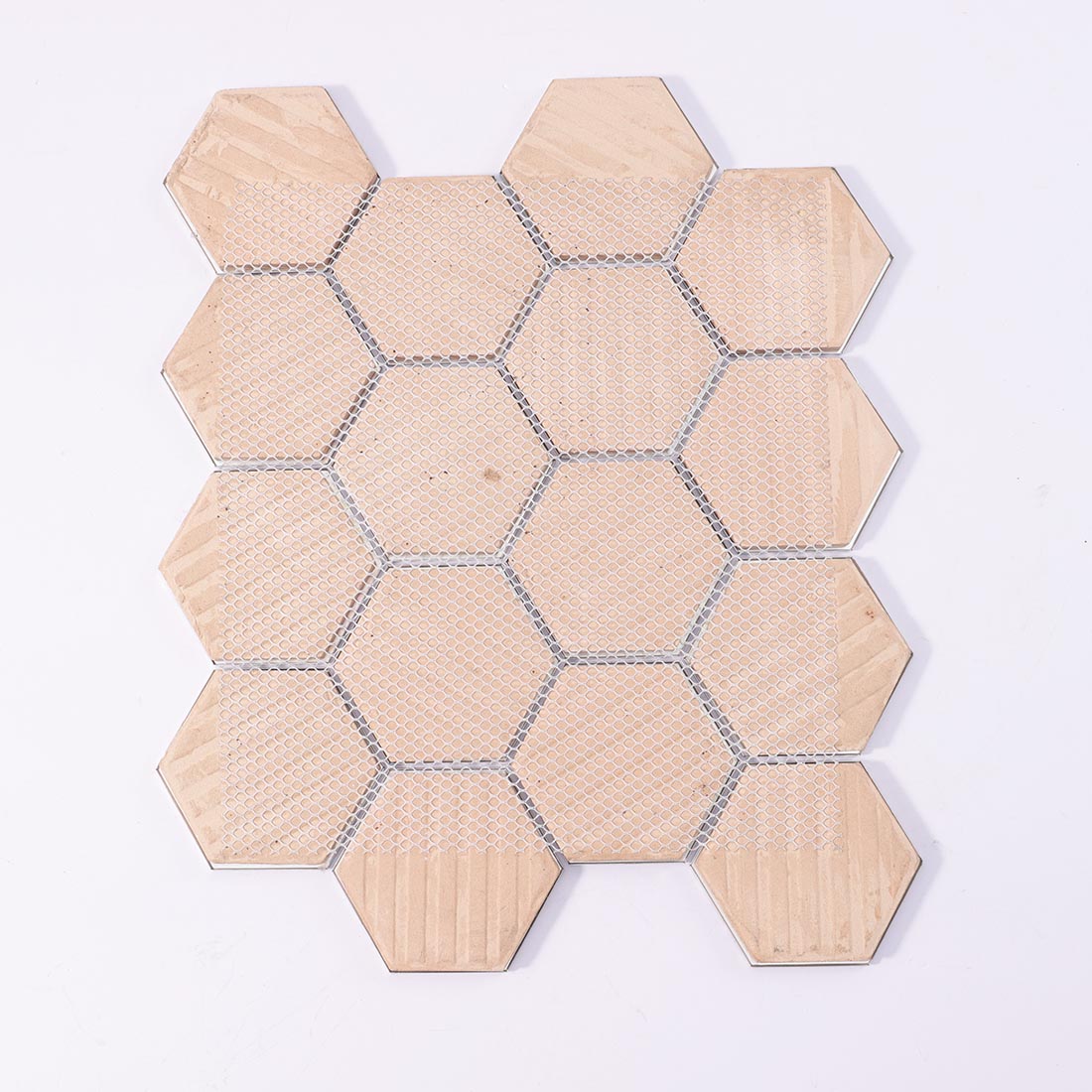 Mesh backing on reverse side of black silver hexagon aluminum mosaic sheet