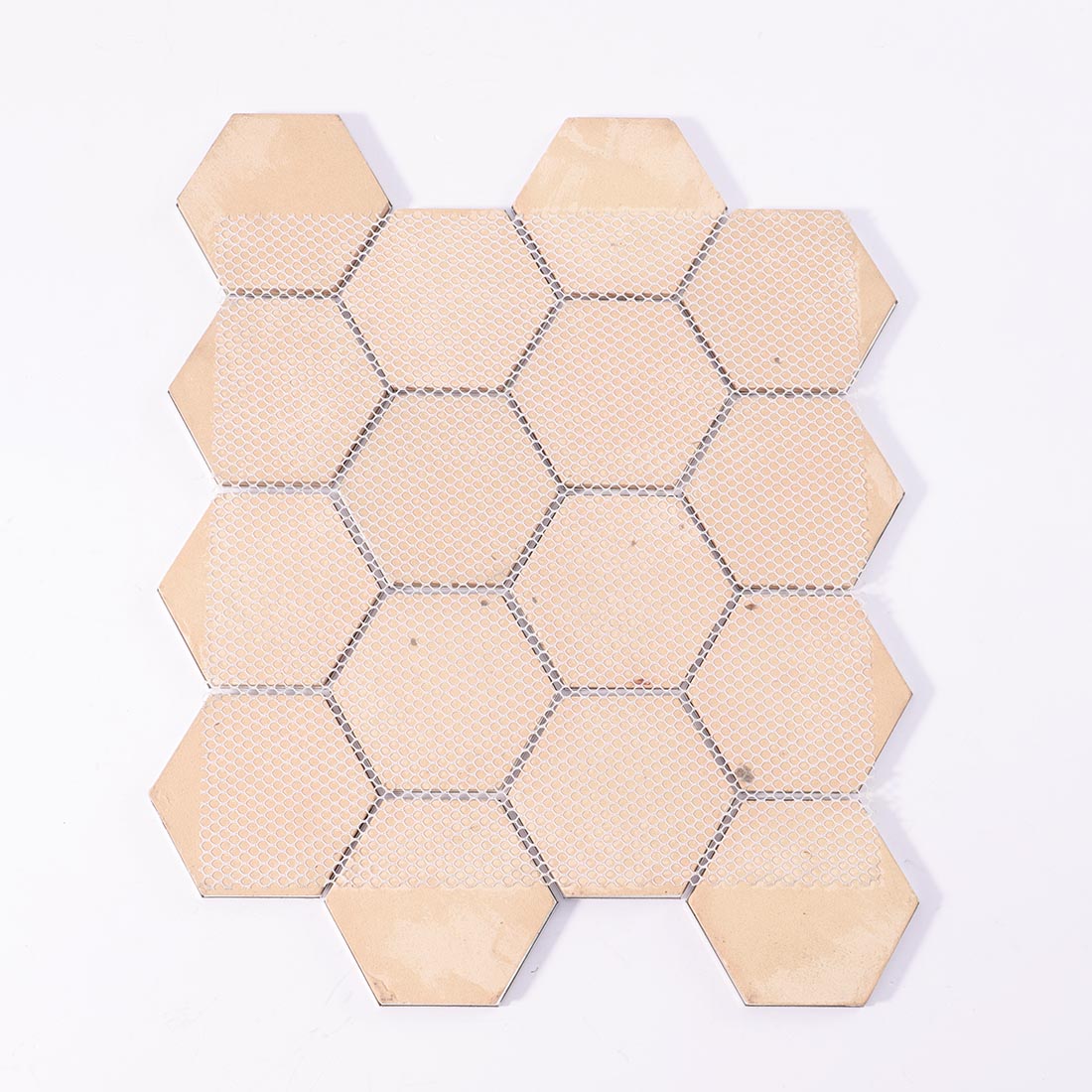 Mesh backing on reverse side of blue marble look hexagon mosaic sheet