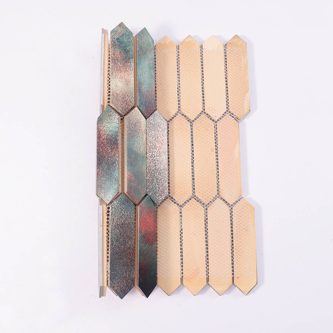 Mesh backing on reverse side of patina copper picket aluminum mosaic sheet