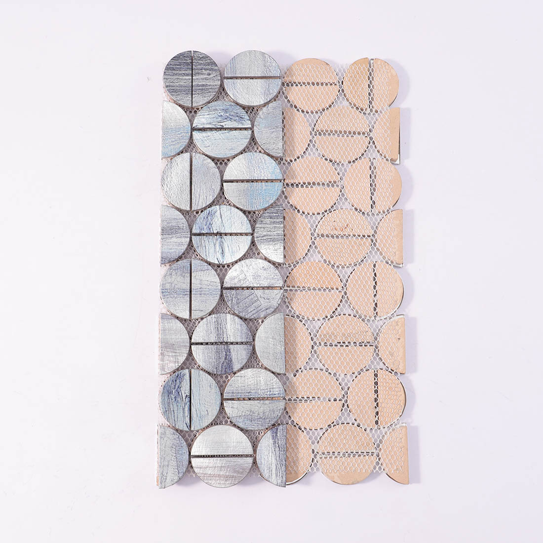 Front and mesh backing view of silver blue round aluminum mosaic tile