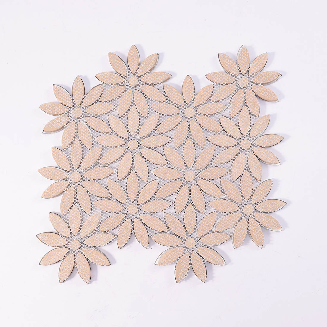 Mesh backing on reverse side of sunflower shape aluminum mosaic sheet