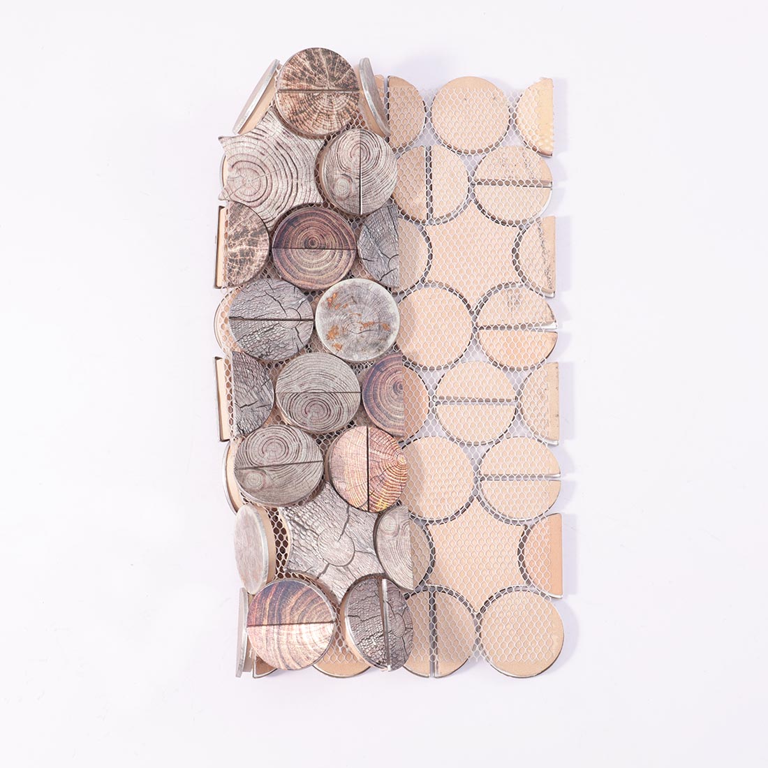 Front and mesh backing view of wood look aluminum round mosaic tile