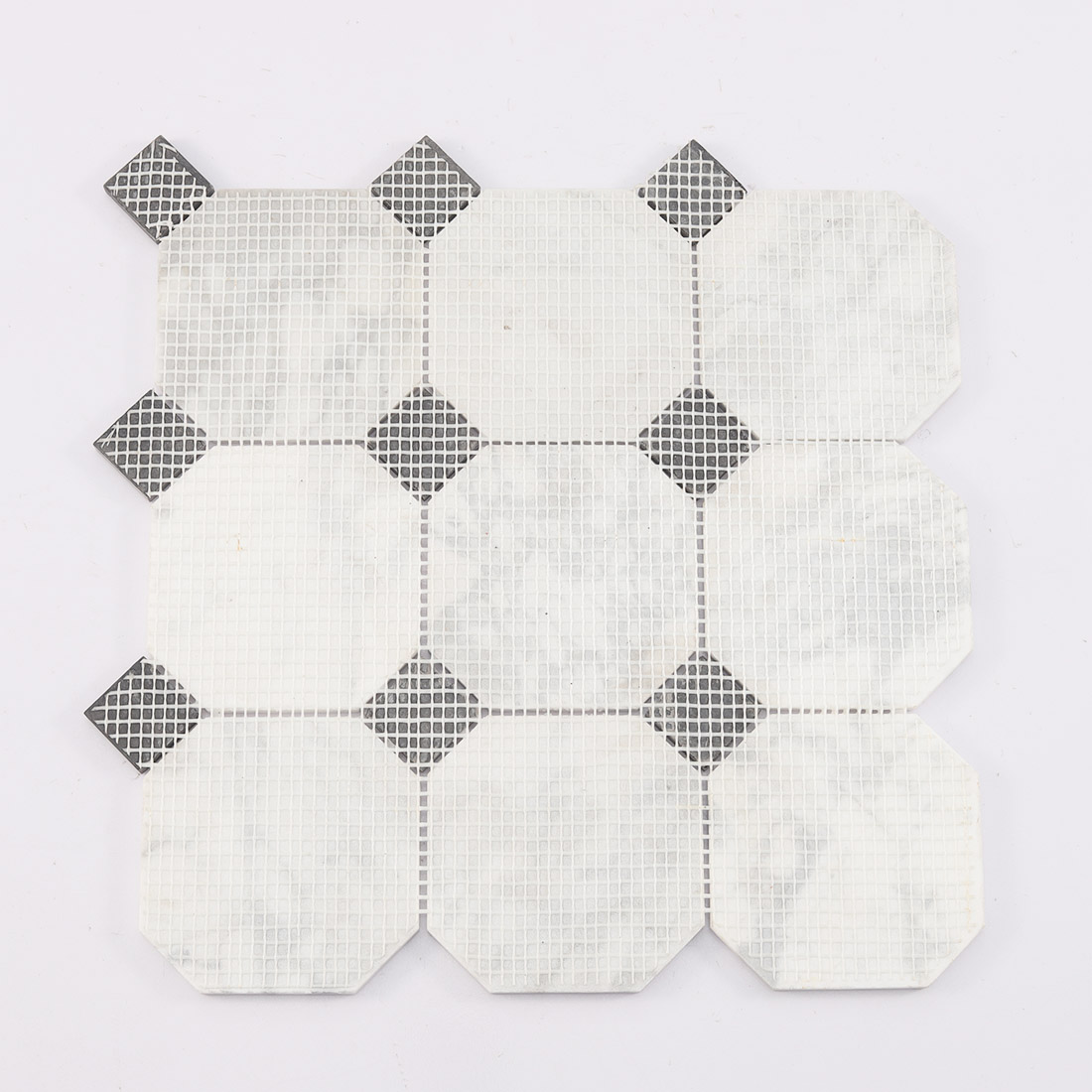 Mesh mounted back of white marble octagon mosaic tile with black dot pieces