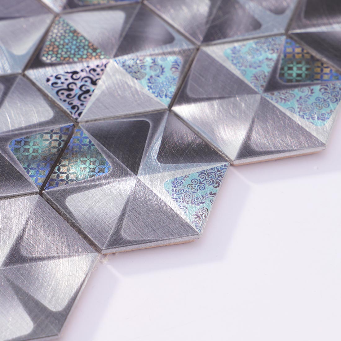 Angle shot of metallic grey 3D hexagon aluminum mosaic tile edge