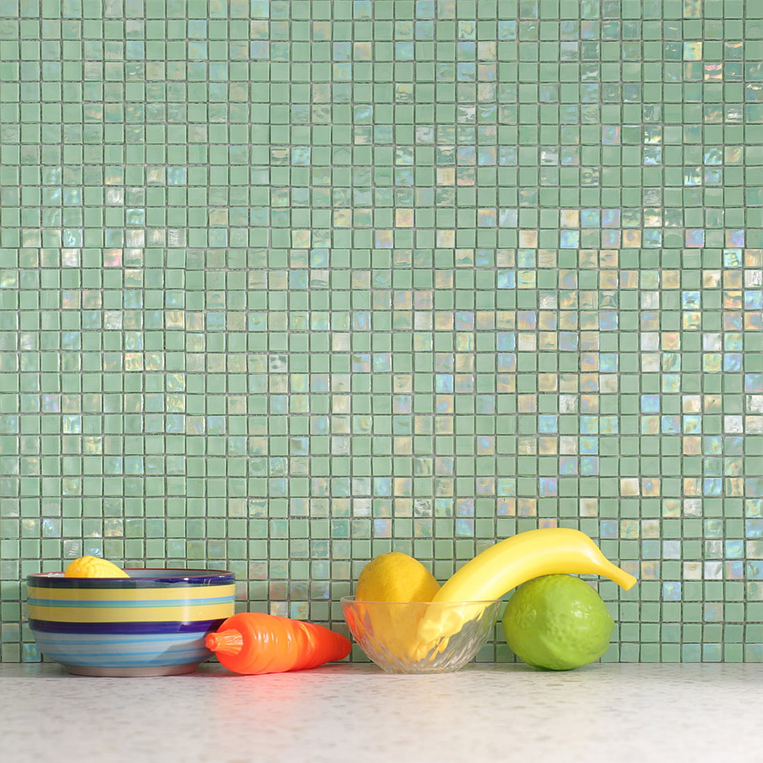 Mint green iridescent square glass mosaic tile used in kitchen backsplash scene
