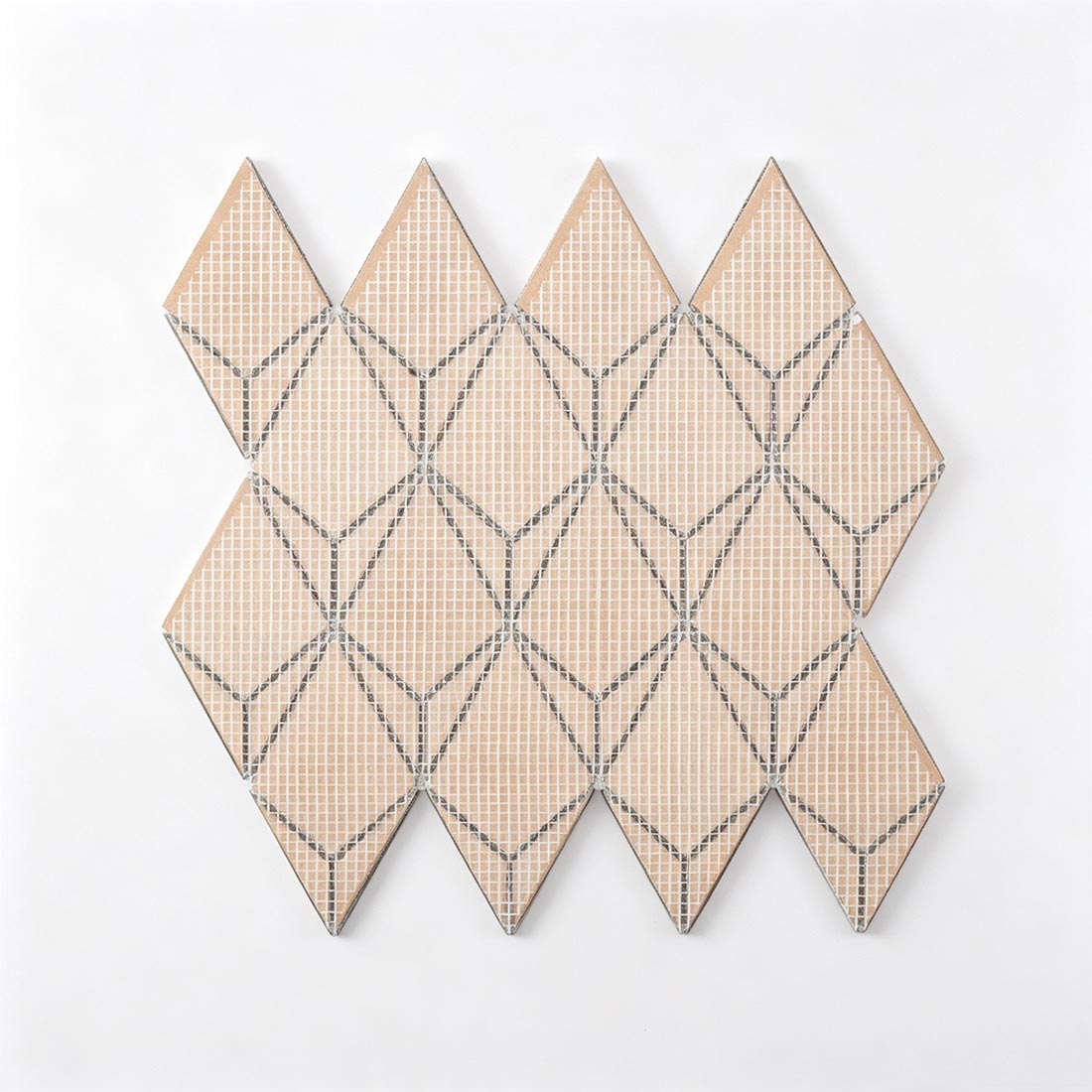 Mesh mounted backing of mint green kite-shaped metal mosaic for easy installation