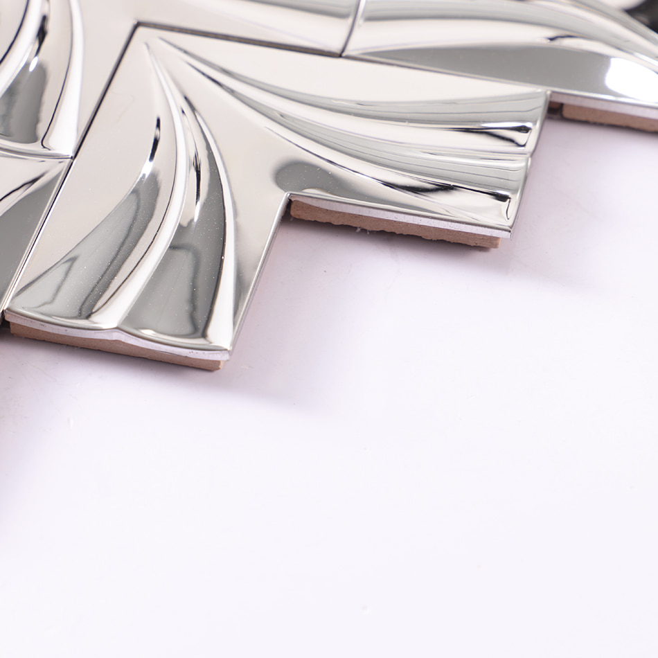 Edge detail of mirror silver chevron stainless steel mosaic tile sheet