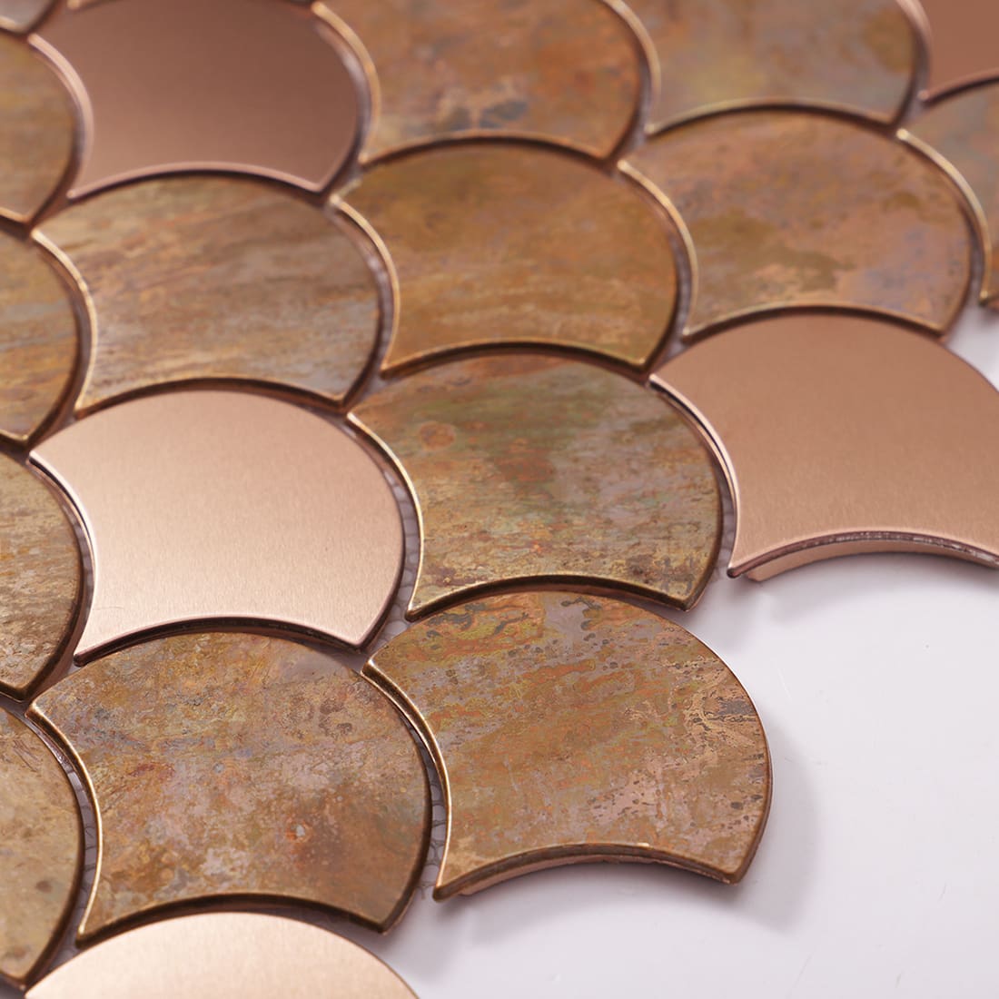 Mixed copper fish scale metal mosaic tile with oxidized texture detail