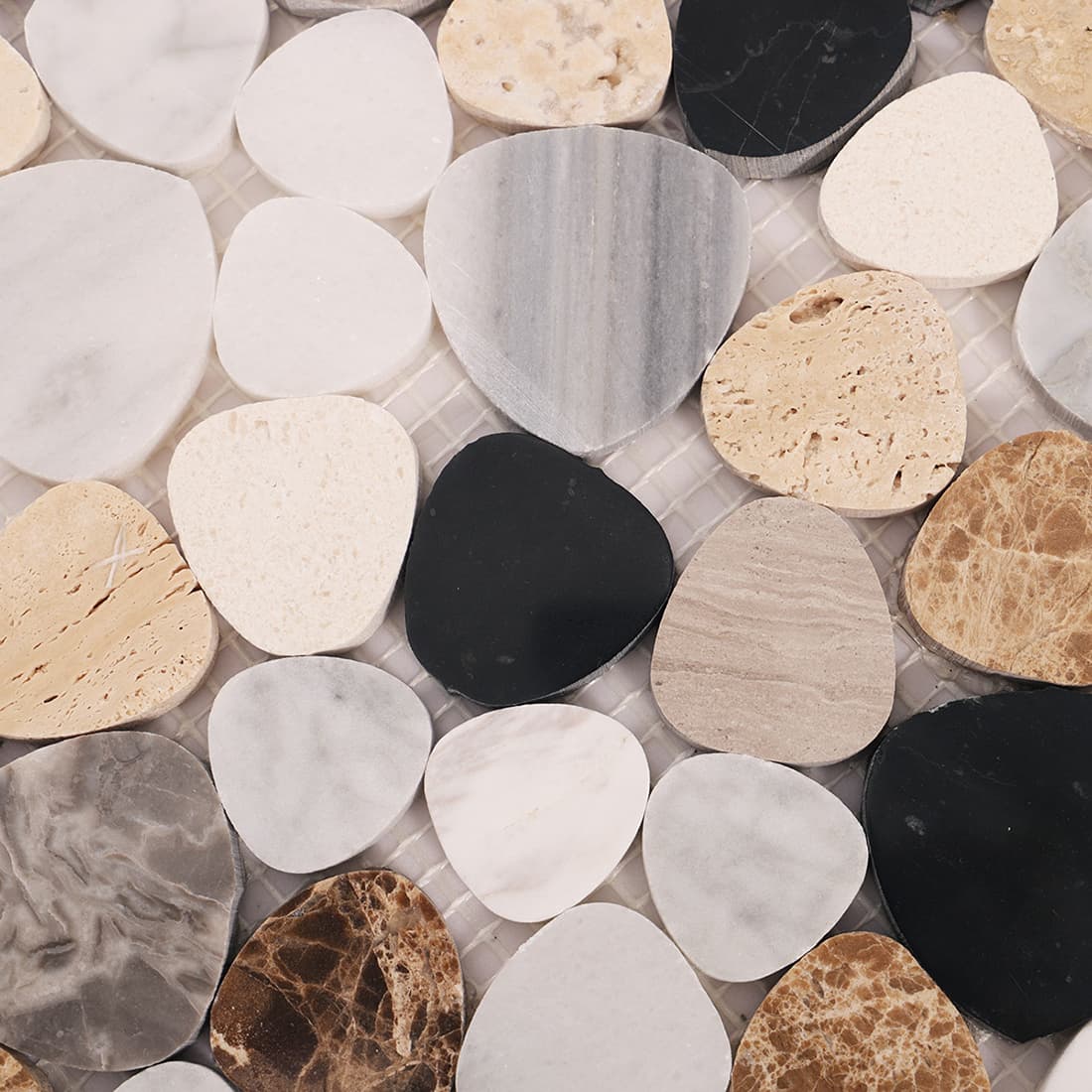Macro close up showing the texture of pebble marble mosaic tiles