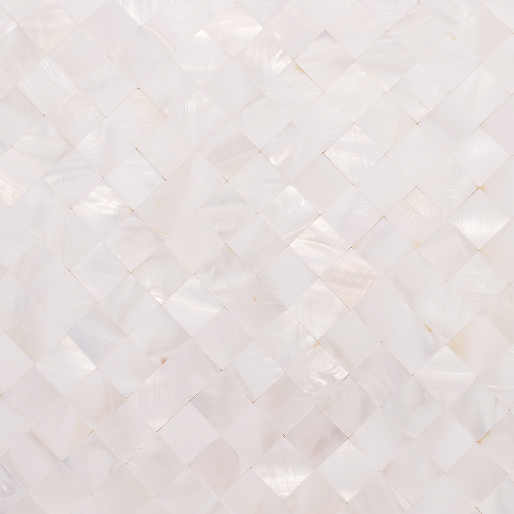 Diagonal pattern close-up of white shell square mosaic tile.