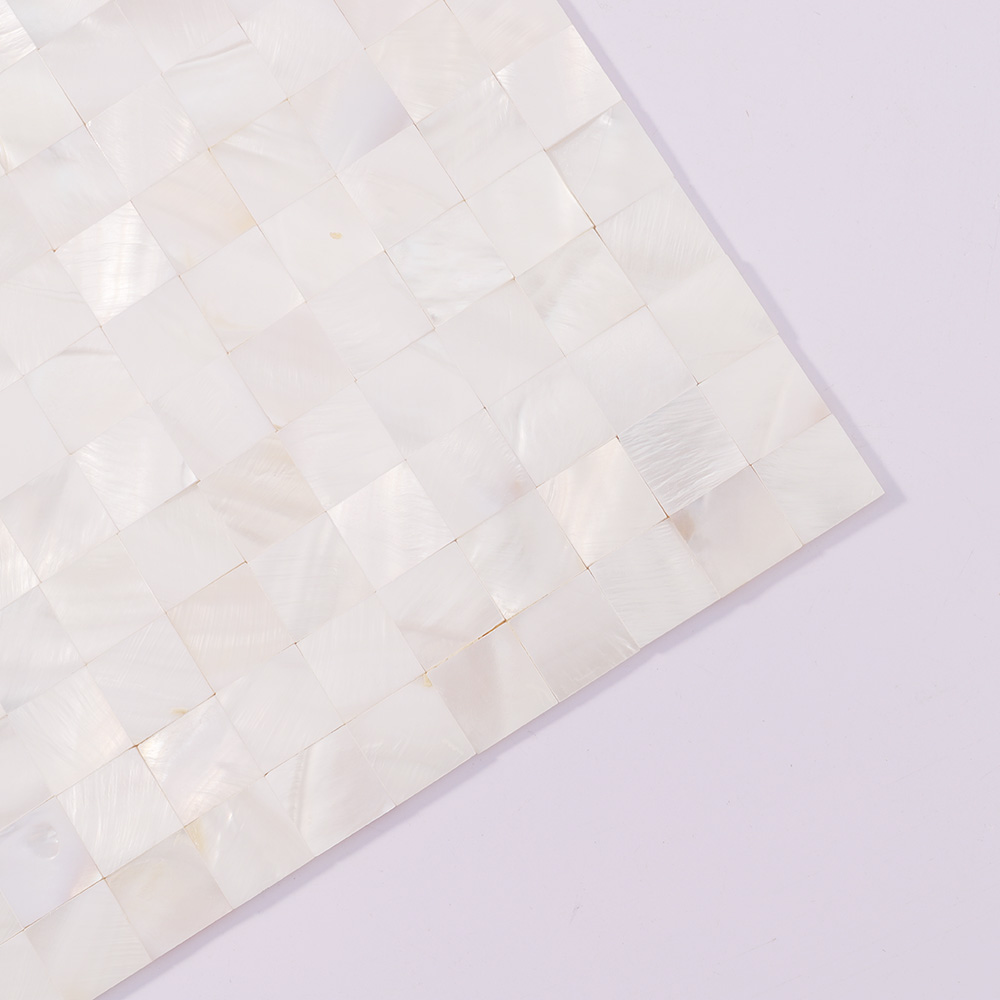 Corner detail of white shell square mosaic tile sheet.