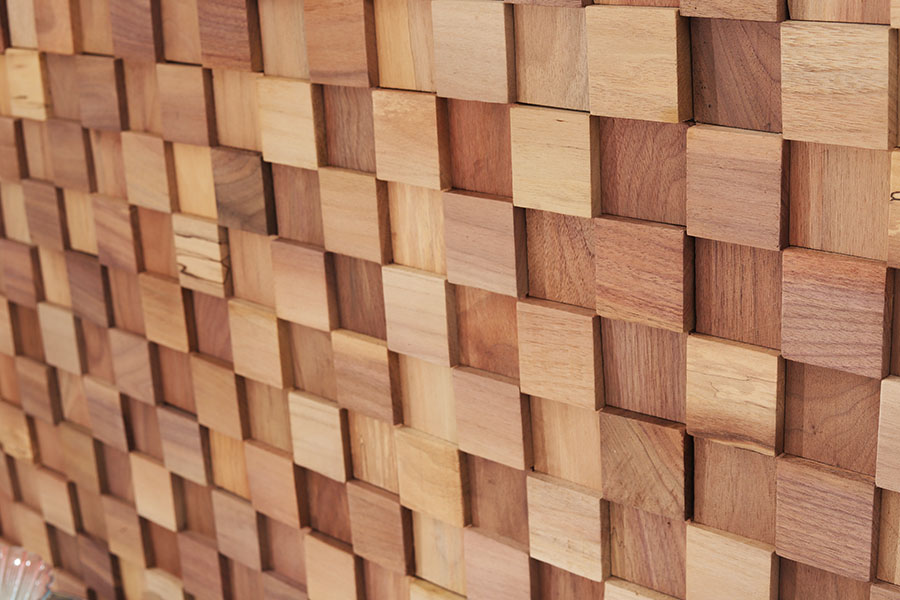 {"default":"Layered natural wood 3D wall panel with square cubes creating texture"}
