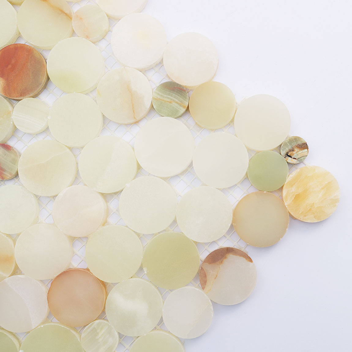 Close up corner view of natural onyx circle mosaic tile texture