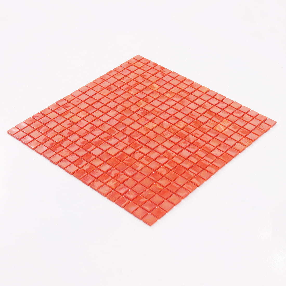 Angled view of orange 15mm square glass mosaic tile sheet
