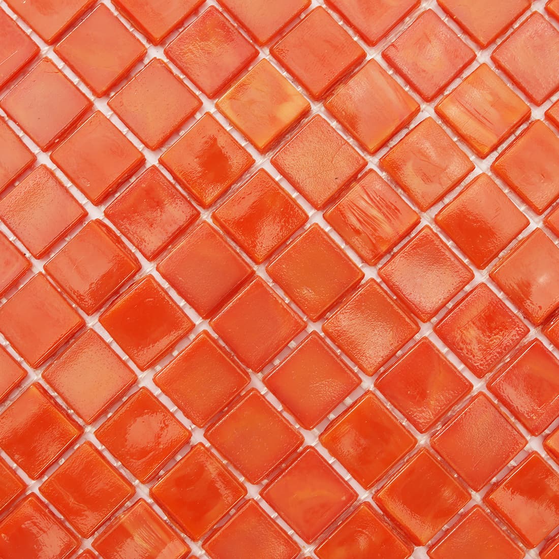 Close-up of orange 15mm square glass mosaic tile surface