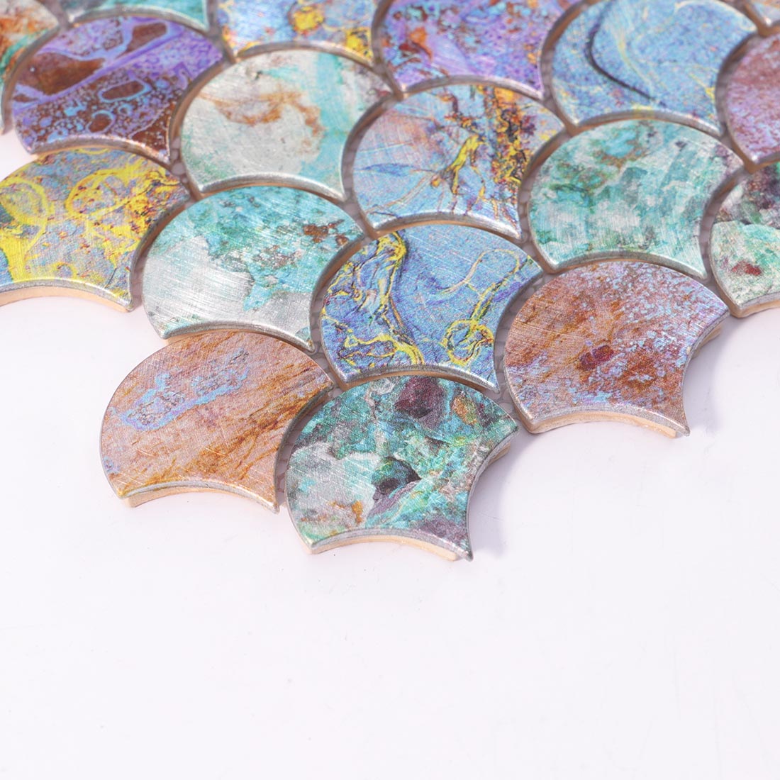 Angle shot of oxidized verdigris fish scale aluminum tile showing edge