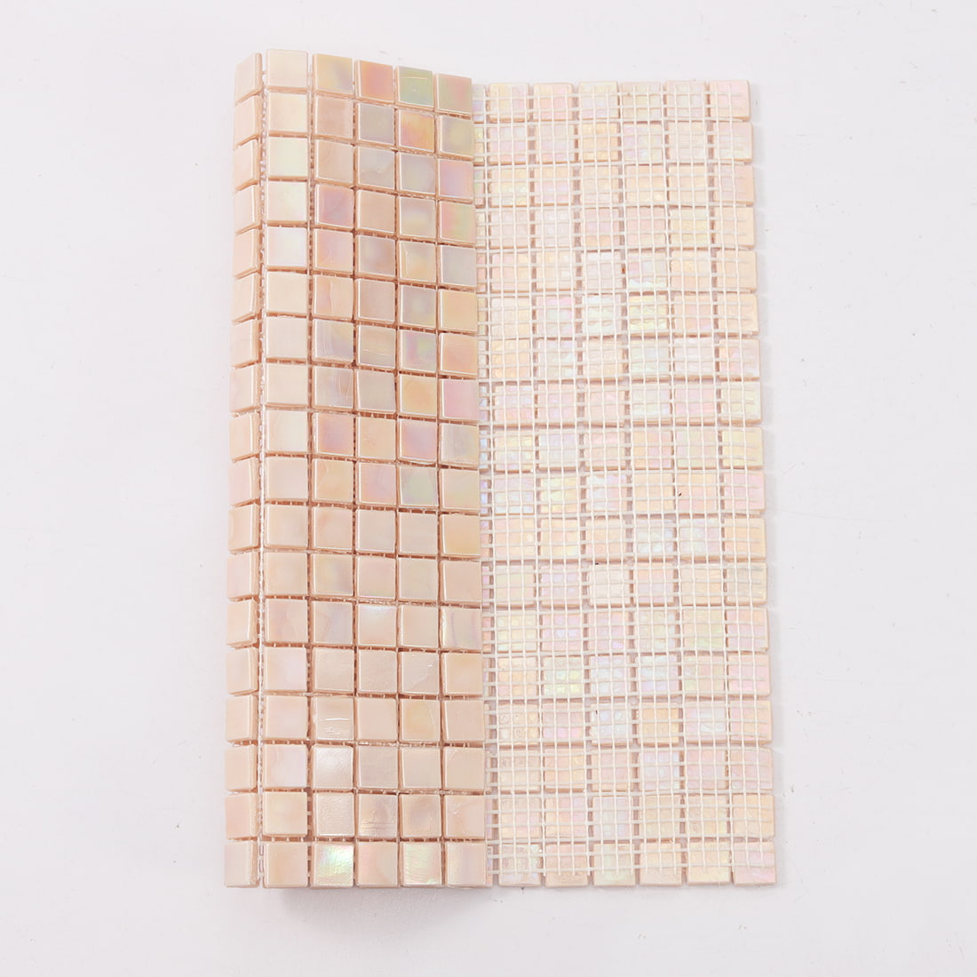 Mesh backing view of pastel iridescent blush pink square glass mosaic sheet