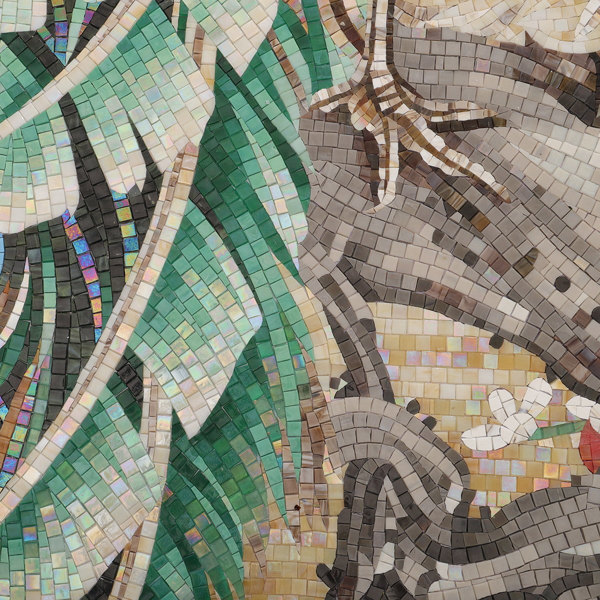 Close-up of peacock mosaic artwork showing tail feathers and tree branch details