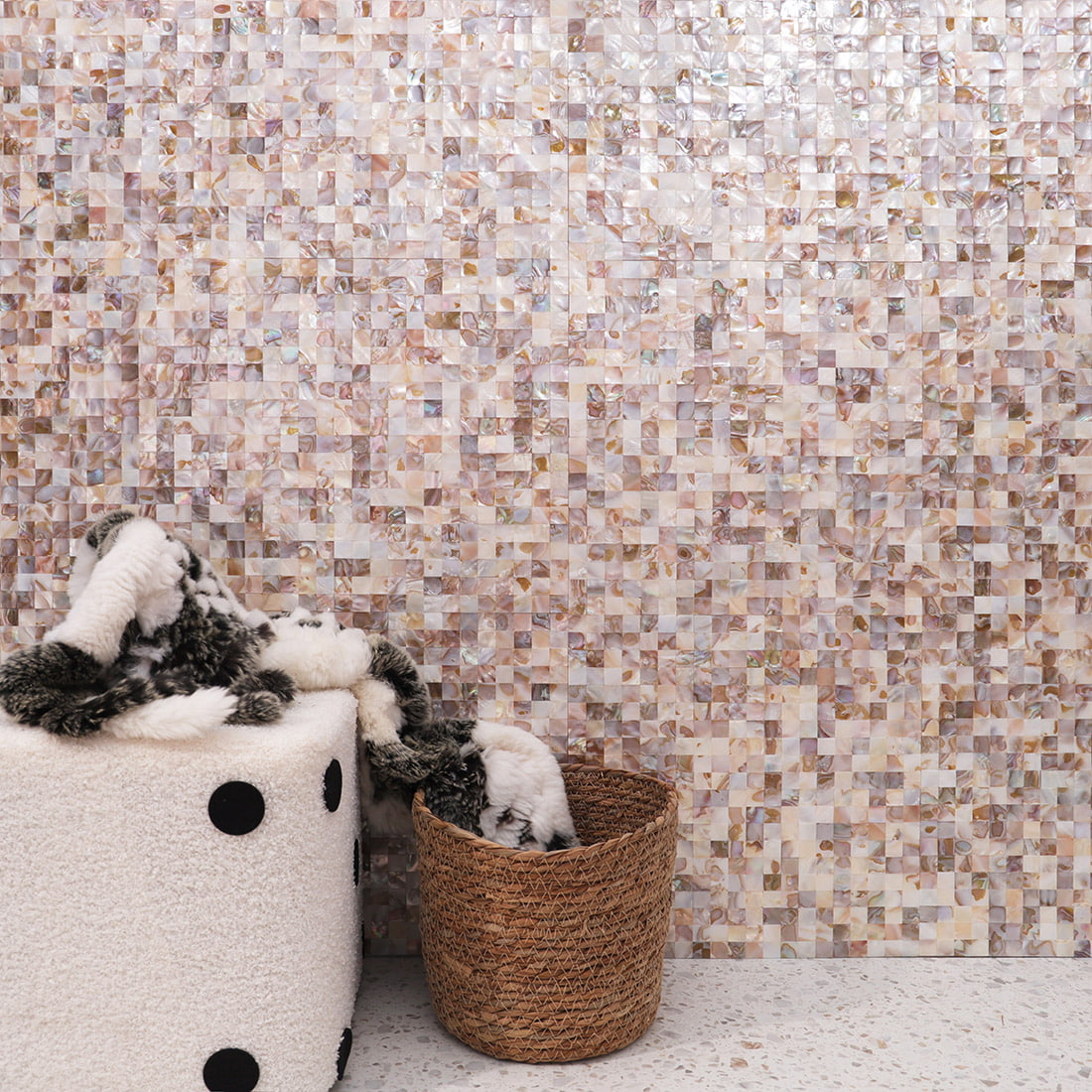 Wide view of pearl shell square mosaic tile feature wall with decor