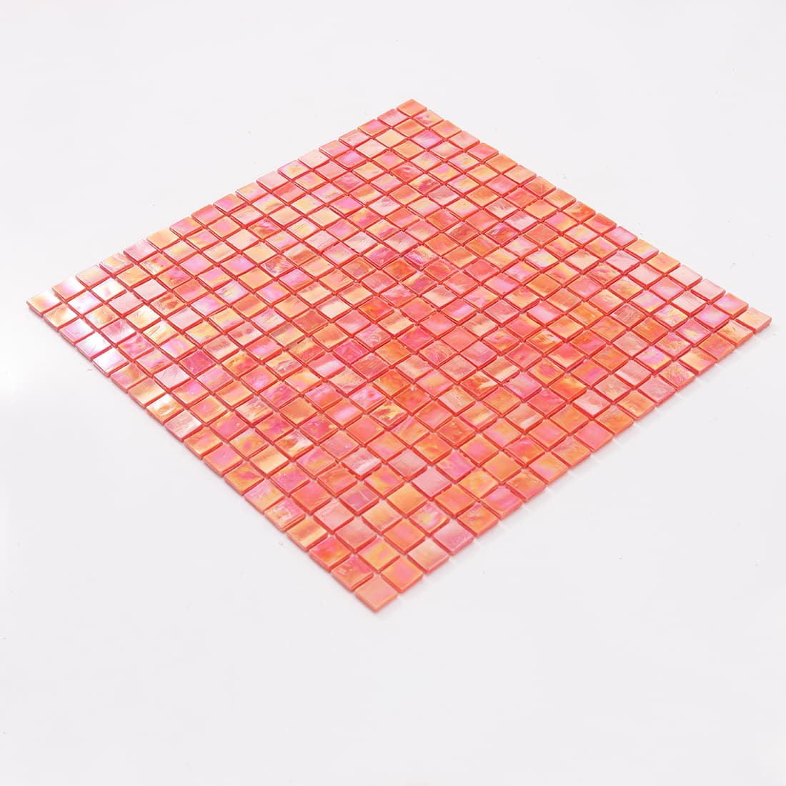 Angled view of pearlescent orange square glass mosaic tile sheet