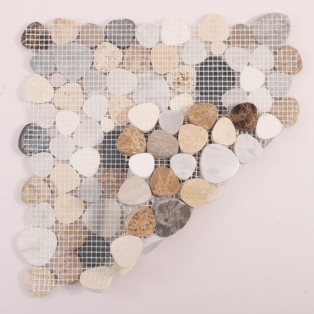 Full back view of pebble marble mosaic sheet showing fiberglass mesh backing pattern