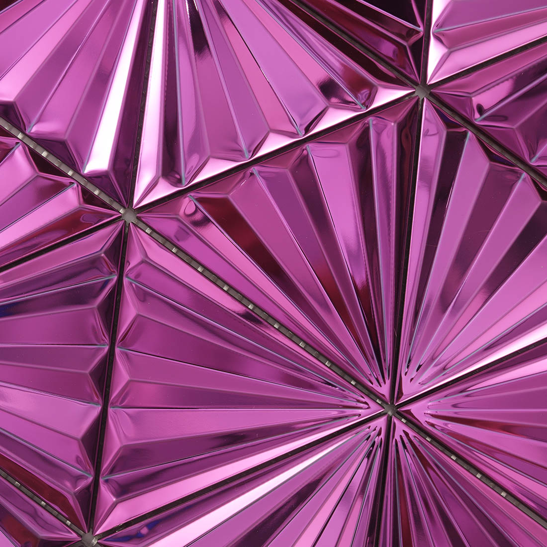 Macro view of pink 3D fan triangle stainless steel mosaic with dark joints