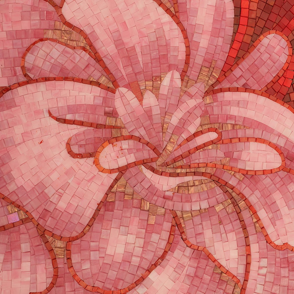 Close-up of pink mosaic flower petals with intricate tile patterns.