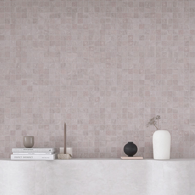 Pink marble tile backsplash with a square mosaic pattern in a minimalist room.