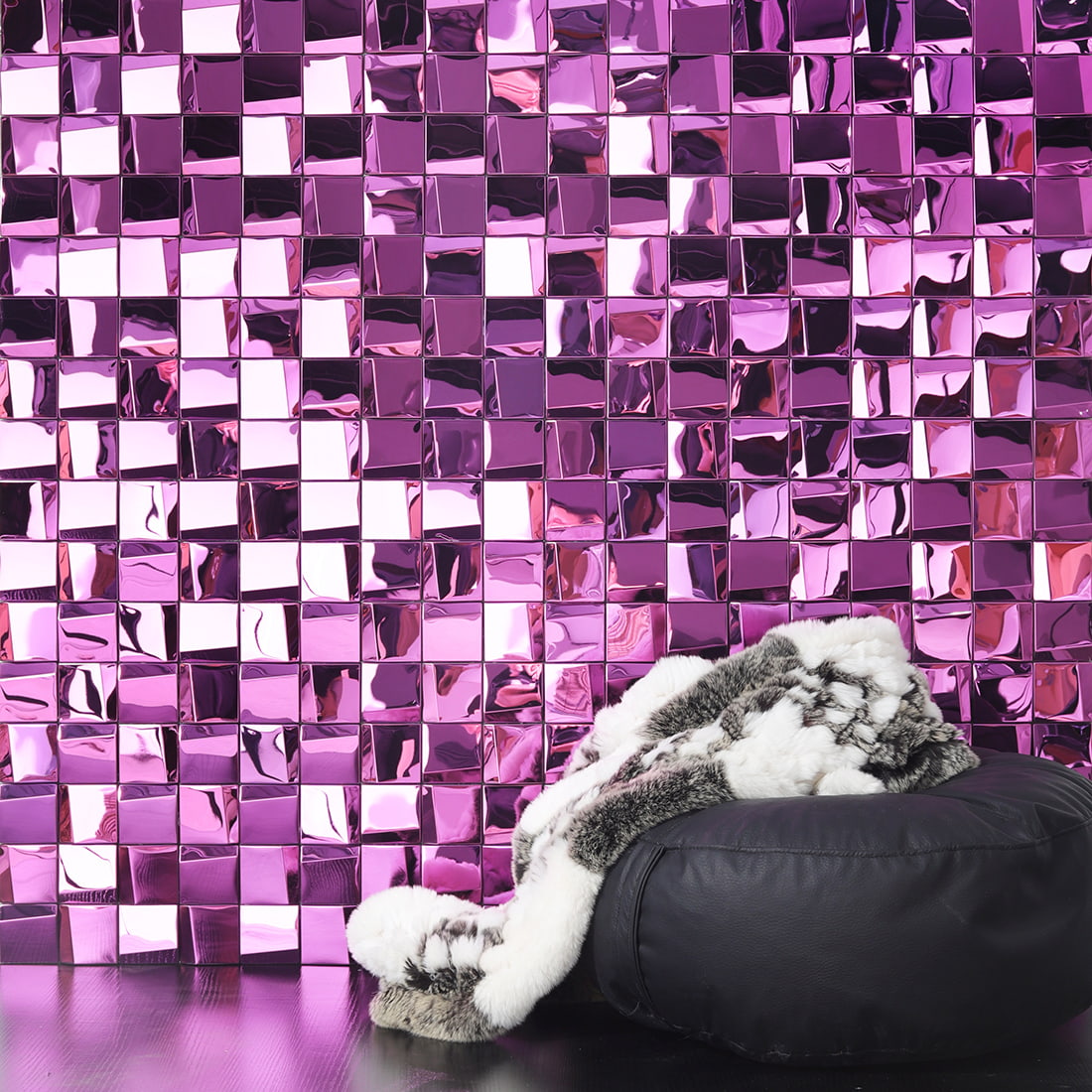 Pink mirror square metal mosaic tile wall behind sofa