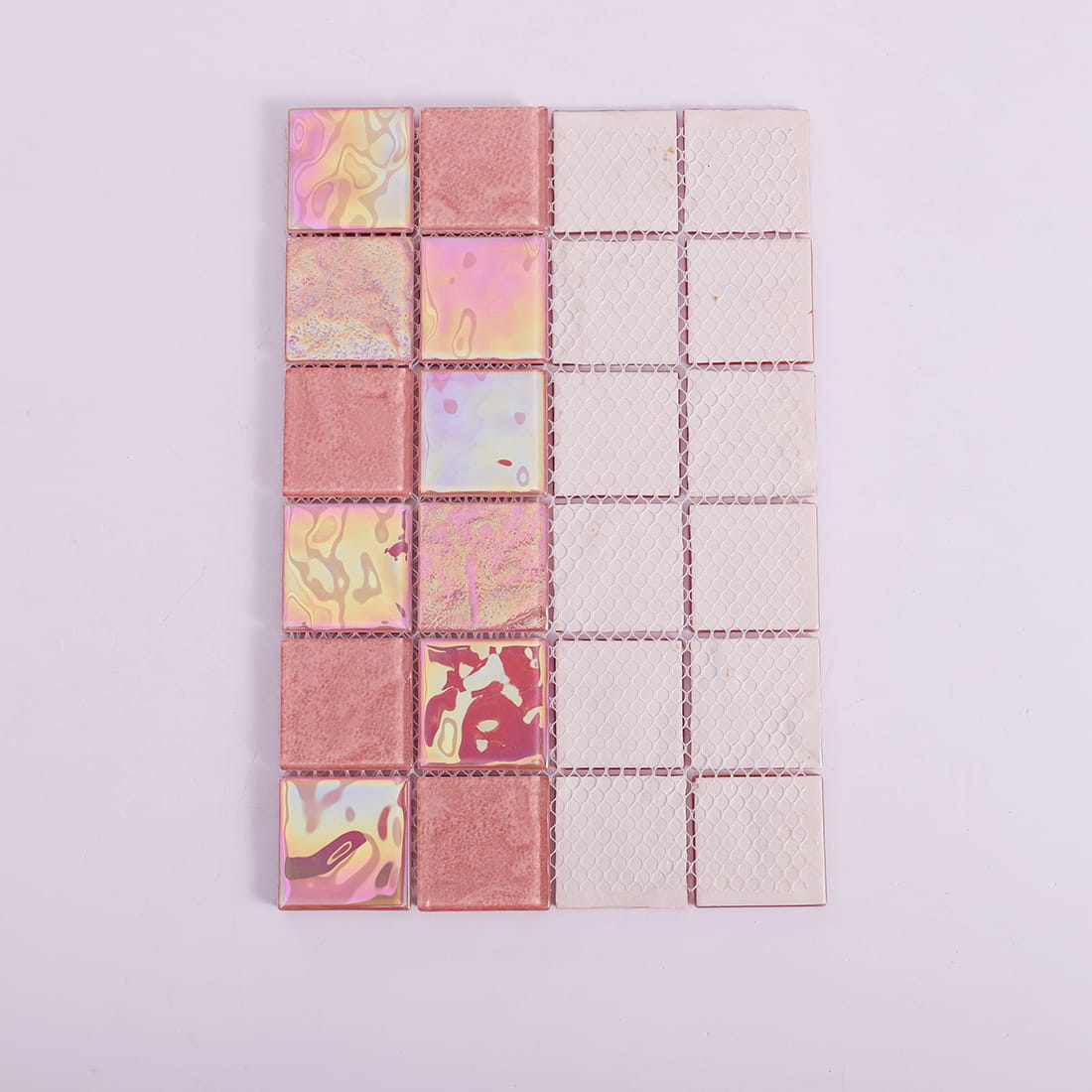 Back mesh view of pink square glass mosaic tile sheet with mixed glossy finish
