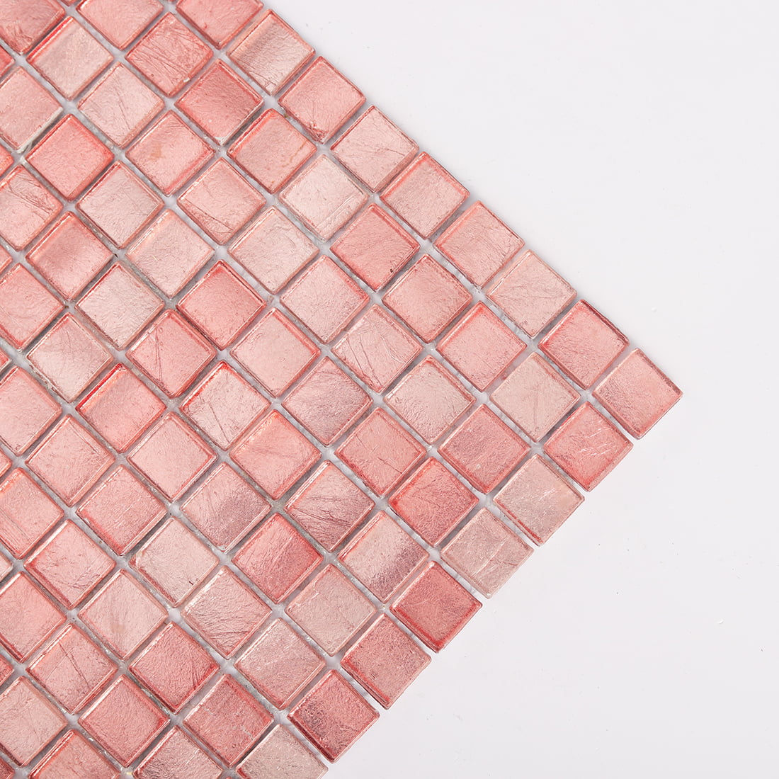 Corner detail of pink square glass mosaic tile