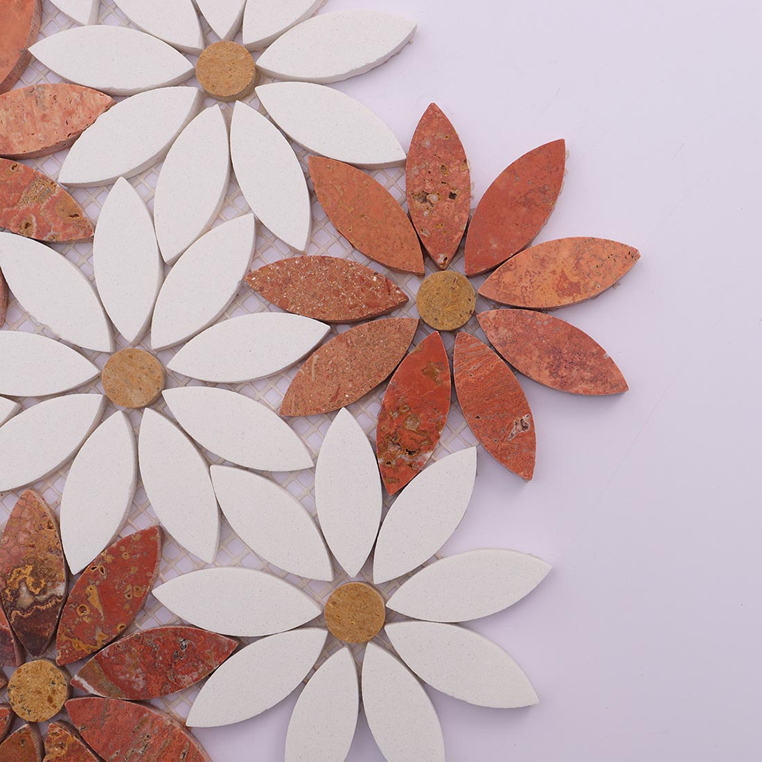 Close-up red and white daisy marble mosaic with leaf petal shapes.