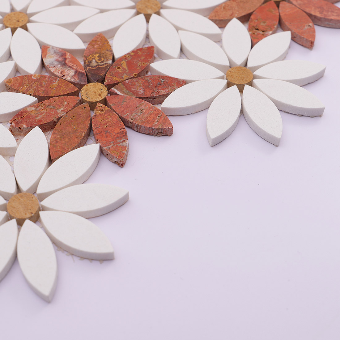 Side view of red and white flower marble mosaic showing petal thickness.