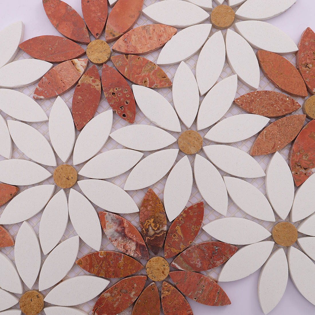 Red and white flower marble mosaic tile close-up with natural stone texture.