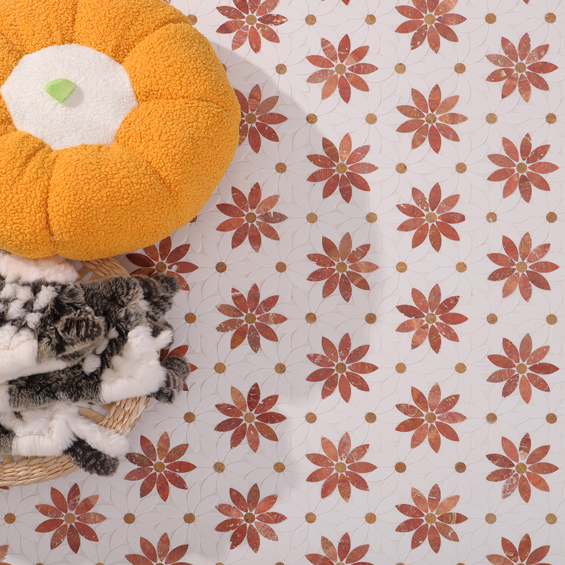 Red and white floral marble mosaic floor tile lifestyle close-up.