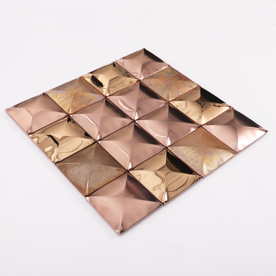 Angled sheet view of rose gold mixed metal square 3D mosaic tile