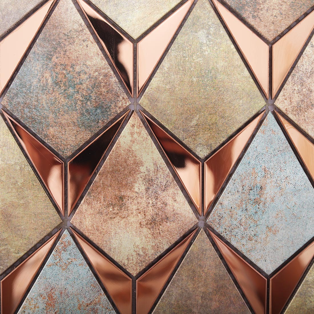Detailed view of rose gold multicolor aluminum mosaic tiles in a faceted kite pattern