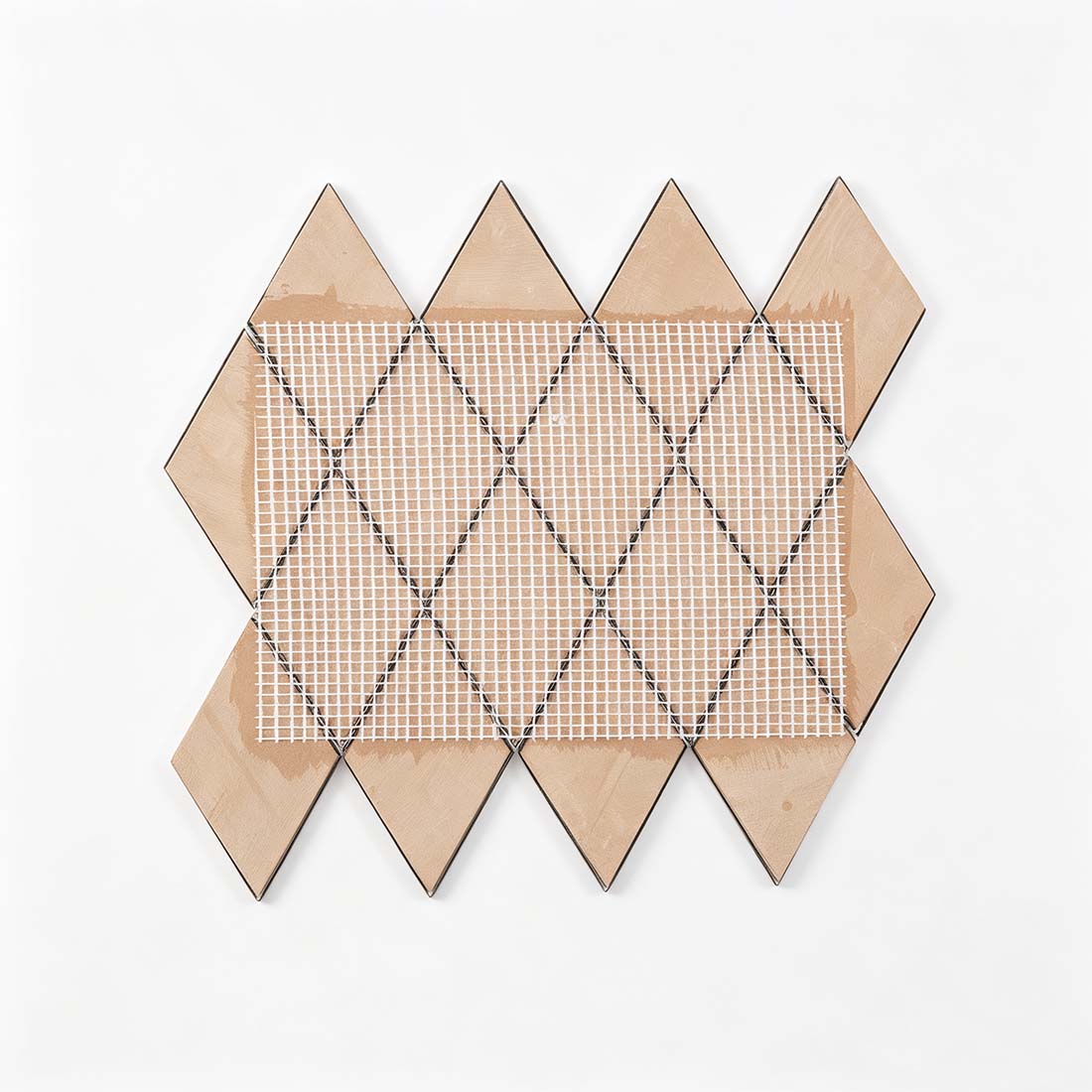 Mesh mounted backing of rose gold rhombus stainless steel mosaic tile